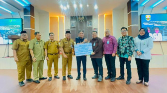 Lindungi 3.329 Pekerja Rentan dan Sawit, Pemkab Muaro Jambi Luncurkan Jaminan Sosial Ketenagakerjaan Berbasis DBH